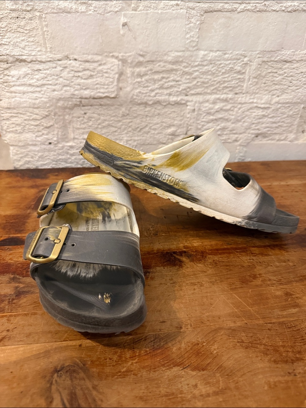 Birkenstock Slide Sandals in Black, White & Gold